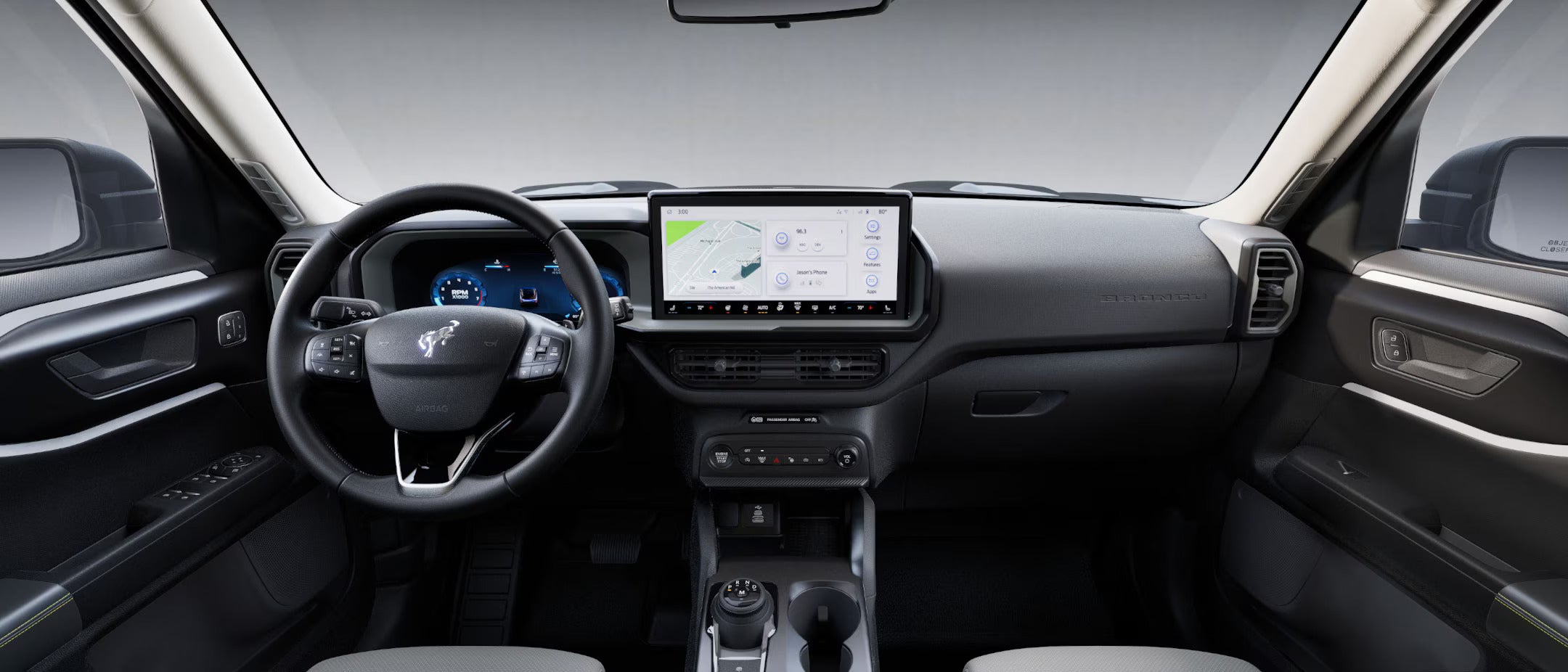 2025 Ford Bronco Sport interior featuring a 13.2-inch touchscreen display and digital gauge cluster.